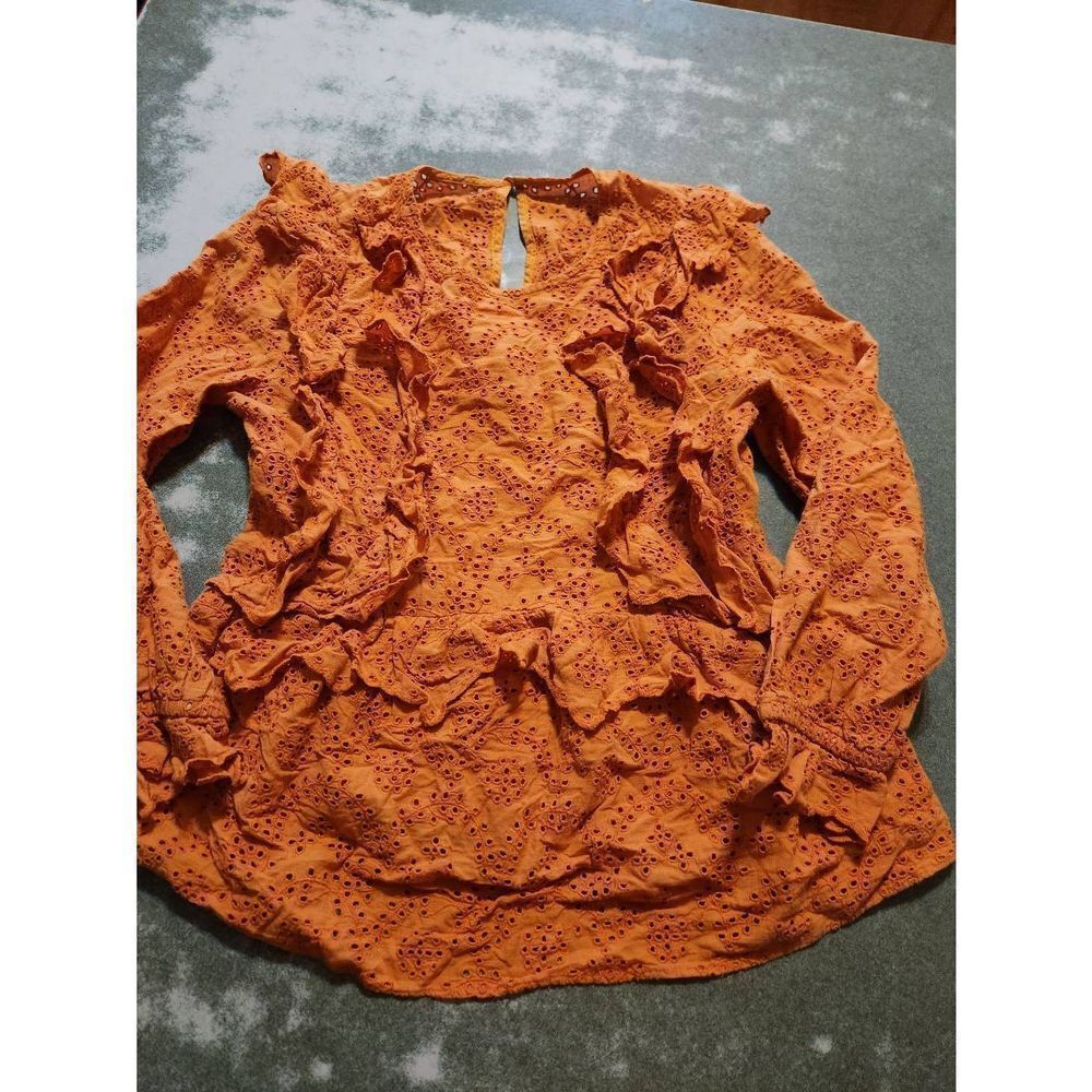 The Great orange eyelet ruffle blouse